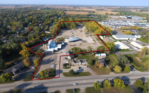 An aerial shot of land in Hutchinson, MN. There is a large area of land outlined with a red border.